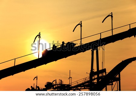 Roller Coaster in sunset
