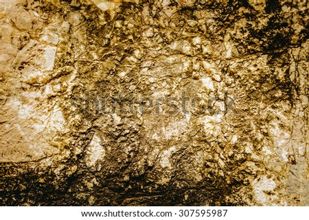Close up texture of grunge cracked old stone wall.For art texture or web design and web background.