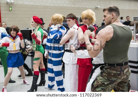 LONDON, UK - OCTOBER 28: Street Fighter cosplayers pose at the London Comicon MCM Expo. Most participants dress up as superheroes for the Euro Cosplay Championship. October 28, 2012 in London.