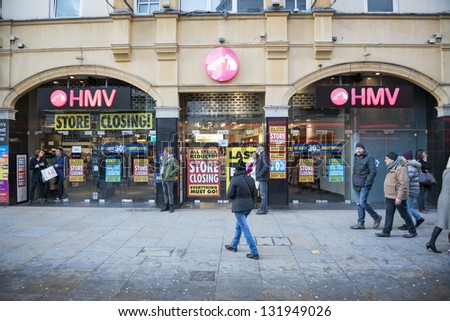 LONDON, UK - MARCH 16: HMV store front window in Piccadilly Circus with closure promotion posters. The chain opened in 1921 and went into administration in January 2013. March 16, 2013 in London.