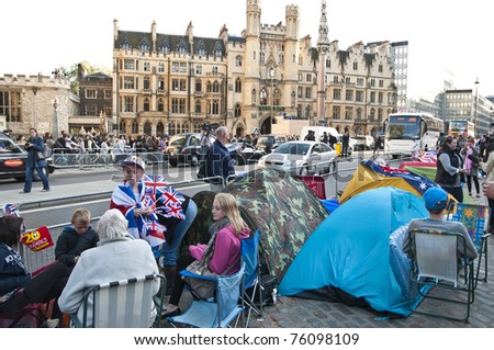 LONDON - APRIL 27: Royal family fans camp to secure a good spot at Westminster Abbey for the royal wedding celebration to take place April 29. April 27, 2011 in London, England.