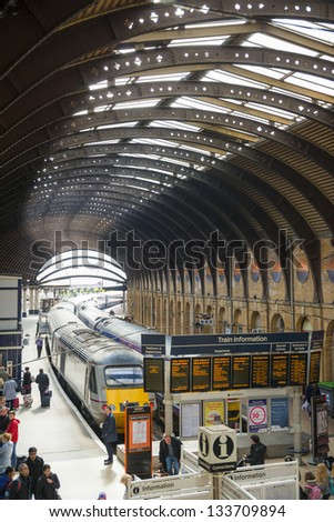 YORK, UK - MARCH 29: Trains in York Railway Station. Inaugurated in 1877 and bombed during WW2, it is one of the most important railway junctions in the British network. March 29, 2013 in York.