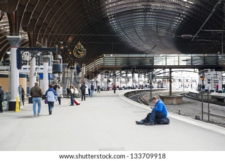 YORK, UK - MARCH 31: Platform in York Rail Station. Inaugurated in 1877 and bombed during WW2, it is one of the most important railway junctions in the British network. March 31, 2013 in York.