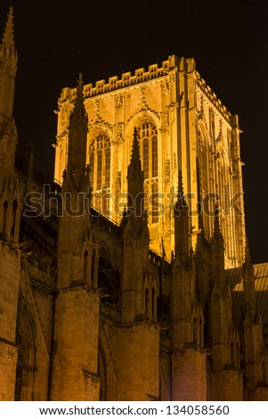 YORK, UK - MARCH 30: Detail of the Central Tower of York Minster illuminated at night. The Minster dates back from 1291 March 30, 2013 in York.