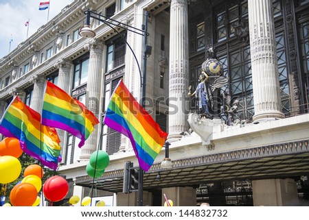 LONDON, UK - JUNE 29: Participants at the gay pride posing for pictures in their balloons outfit, in Baker Street. The yearly parade started in 1972.  June 29, 2013 in London.