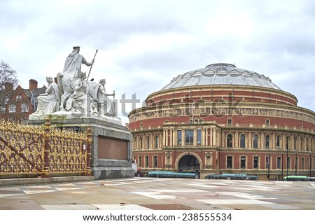 LONDON, UK - DECEMBER 17: Detail of Albert Memorial statue looking at Royal Albert Hall in the background, in Kensington Gardens. December 17, 2014 in London.