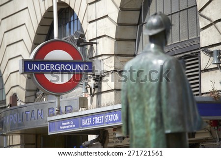 LONDON, UK - APRIL 22: Bronze statue of Sherlock Holmes in front of Baker Street station. April 22, 2015 in London. The statue was commissioned by the Sherlock Holmes Society in 1999.