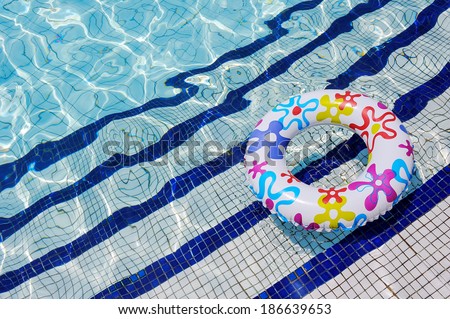 Colorful ring in swimming pool Colorful ring in swimming pool
