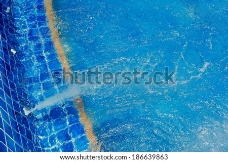 The circulation of water in the pool.