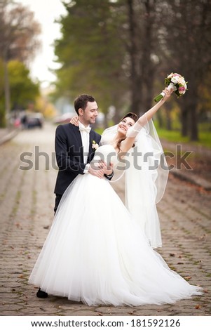Married couple dance in the old road
