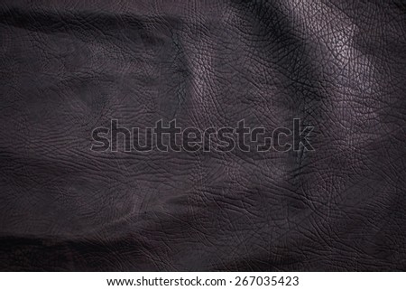 Black Leather for Concept and Idea Style of Fine Leather Crafting, Handcrafts Workspace, Handmade or Handcrafted Leather Worker. Background Textured and Wallpaper. Vintage Rustic. Close up Full frame.