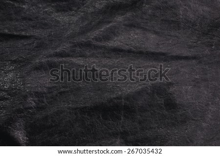 Black Leather for Concept and Idea Style of Fine Leather Crafting, Handcrafts Workspace, Handmade or Handcrafted Leather Worker. Background Textured and Wallpaper. Vintage Rustic. Close up Full frame.