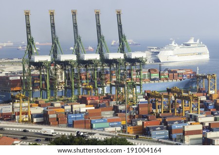 SINGAPORE- April 14: Singapore commercial port on April 14, 2014 in Singapore. It\'s the world\'s busiest port in terms of total shipping tonnage, it transships a fifth of the world shipping containers.