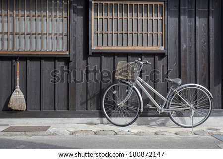 Bicycle and broom in front of old Japan house, Shirakawa go ,Japan