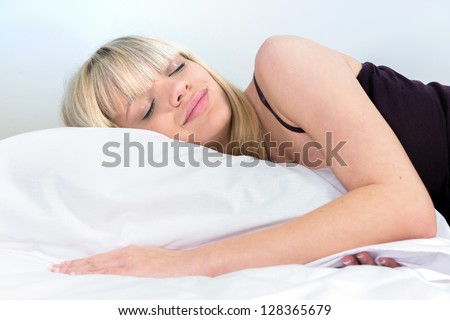 Portrait of a cute girl sleeping on a pillow
