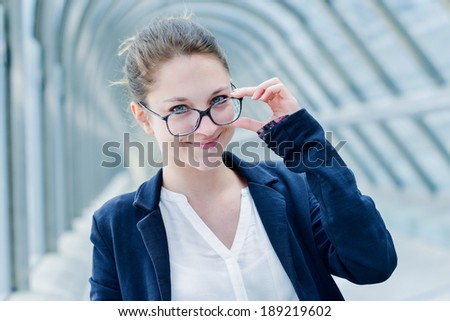 Outdoor portrait of a dynamic young executive leader woman