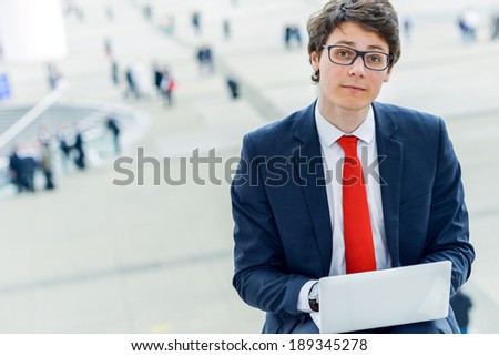Junior executive dynamic working outside of his office