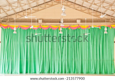 Stage and green curtain