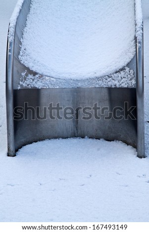 Slide covered in snow closeup