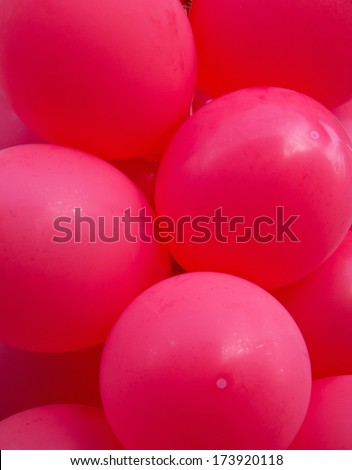 Red balloons closeup vertical