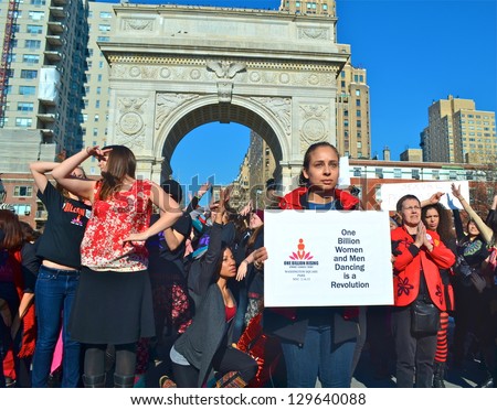 NEW YORK, NY - FEB 14: Nearly 300 women took part in a One Billion Rising flash mob dance in Washington Square Park in New York City, NY on February 14, 2013 to protest violence against women.