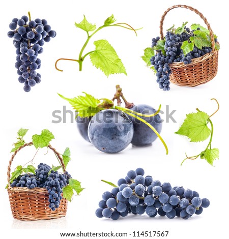 Collection of Dark grapes with leaves in a wicker basket, Isolated on white background
