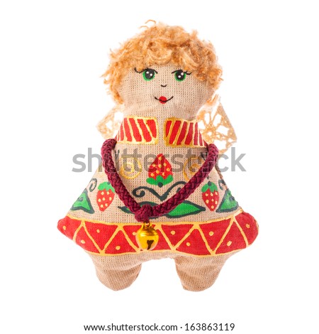 Christmas doll an Flying angel made of a fabric and hand-painted Ukrainian artists, Handmade decoration, Ukrainian souvenir, isolated on white background .