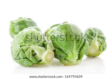 Fresh green Brussels sprouts, cabbage isolated on white background
