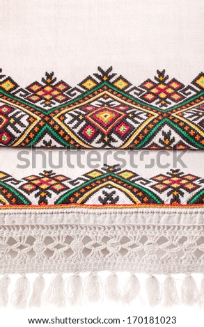 Towel embroidered with a cross, made from natural fabrics and embroidered by hand Ukrainian artists, fabric background