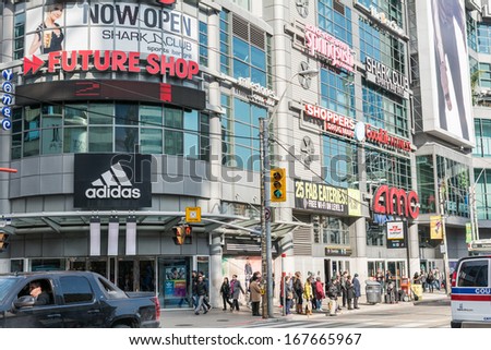 TORONTO, ON, CANADA - OCTOBER 30: Building with various stores at the side of Dundas Square, in Toronto Canada on October 30, 2013