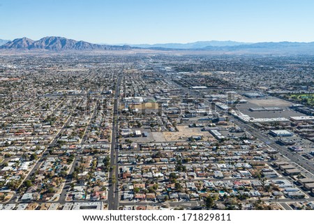 View of Las Vegas and its surrounding urban and mountains from a high vantage point