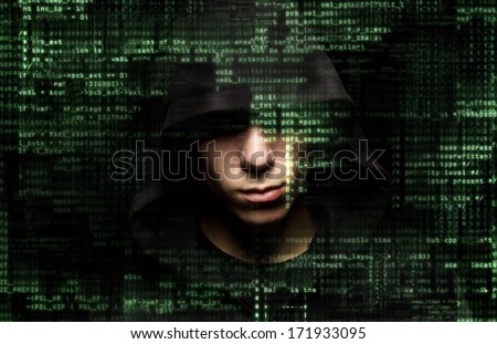 Silhouette of a hacker isolated on black with binary codes on background
