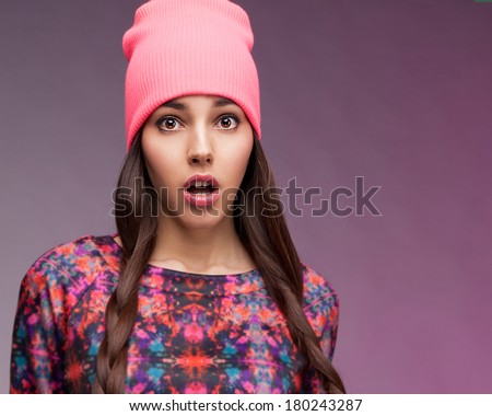 Hipster girl showing wow face