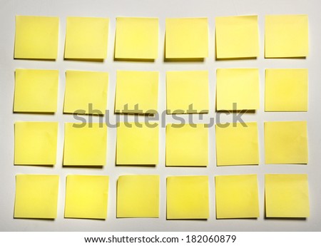 Yellow sticks note on white background, photo