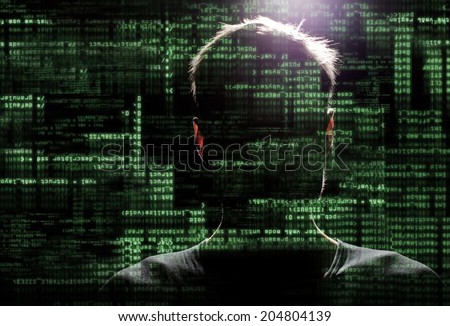Silhouette of a hacker uses a command on graphic user interface