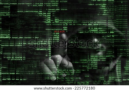 Silhouette of a hacker  on graphic user interface