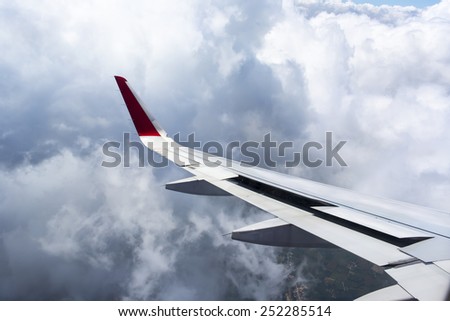 Wing aircraft in the storm sky