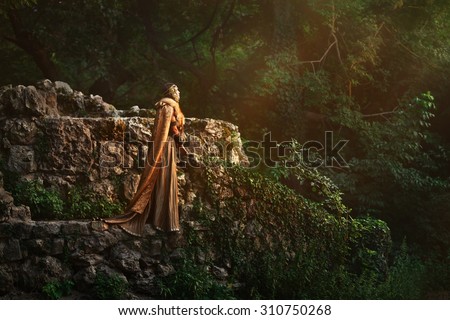 Scandinavian rich girl in deep forest.Medieval story