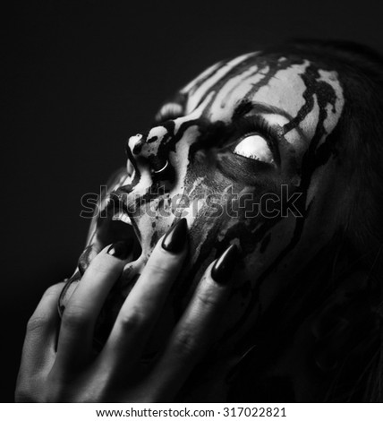 female demon.Art studio shot.Goth girl