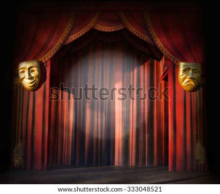 Empty stage with golden comedy masks