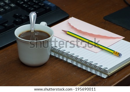 coffee cup on the working desk in office