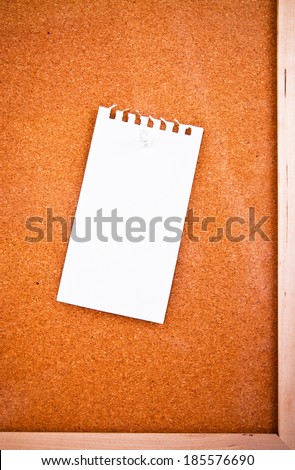 Paper Short Note pin on Wooden Cork Board / write down your text here, background and texture.
