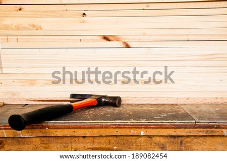 Steel Hammer with Wood Plank in Carpentry Business and Carpenter Wood Work.