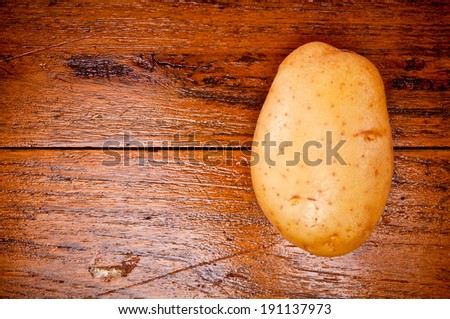 Top view Fresh Potato on Wood Table , Country Rustic Style.