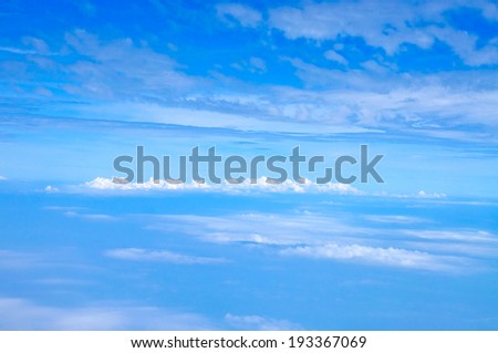 Clouds in the blue sky Above the Sky Shot From Airplane for background wallpaper and texture.