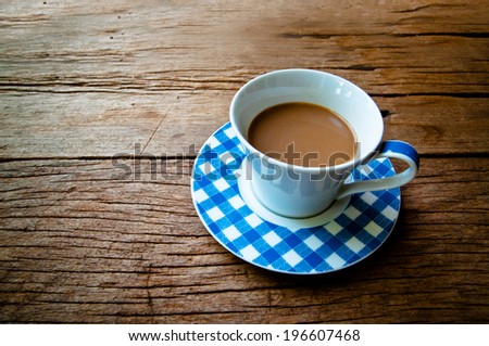 Coffee Mug Blue and White on Wood Table Background, Rustic Style.