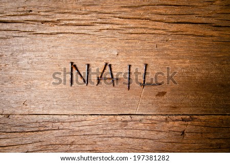 Old Vintage Rust Nails on Wood Table Background, Rustic Style.