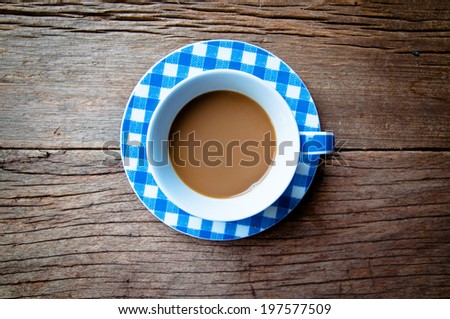 Coffee Mug Blue and White on Wood Table Background, Rustic Style.