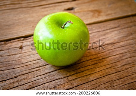 Fresh Green Granny Smith Apple On Wood Table Background, Rustic Still Life Style.