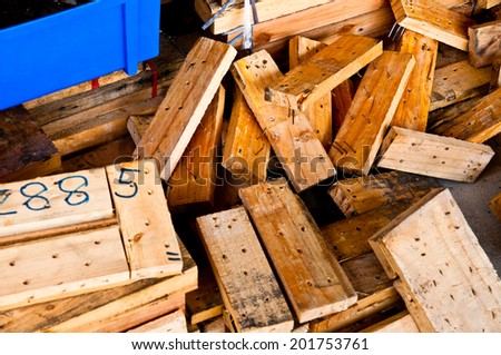 Heap of Old Wood Plank with Rust Nail in Carpentry Business and Carpenter Wood Work for Background and Texture.